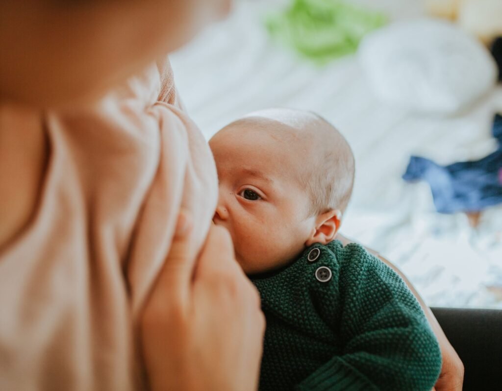 baby boy breastfeeding in public