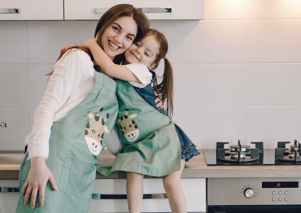 mom in the kitchen with toddler girl daughter- mothers day